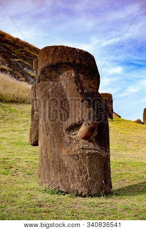 Moai On Ranu Raraku Volcan. Ester Island Landscape