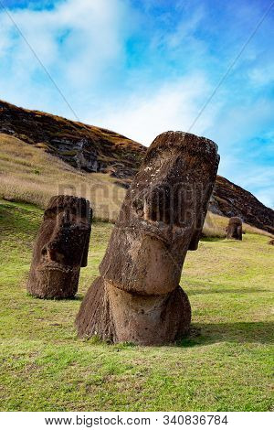 Moai On Ranu Raraku Volcan. Ester Island Landscape