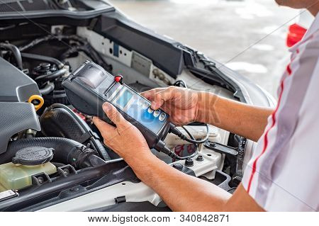 Technician Are Conducting Car Check For Car Repair.