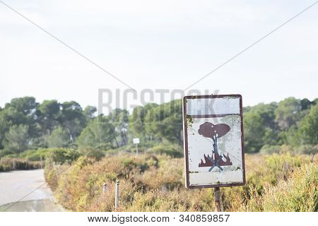 Campos, Majorca - December 07, 2019: Signboard Of A Burning Tree, Prohibited To Make Fire, Preserve 