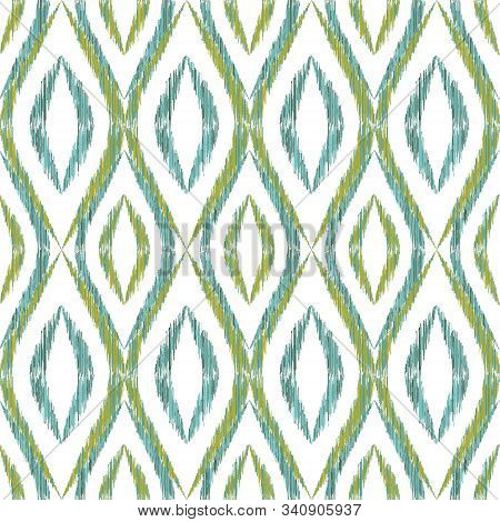 Ikat Ogee Seamless Vector Pattern Illustration. Ethnic Fabric Print Geometric Ikat Pattern. Modern O