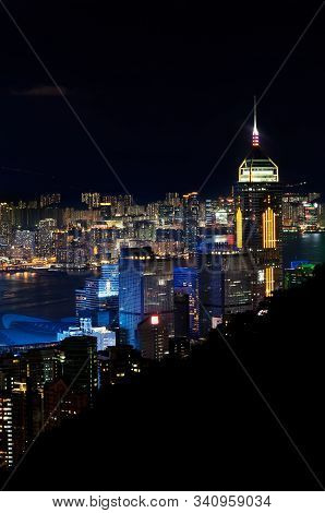 Wanchai, Hong Kong - May 31, 2013 - Central Plaza Skyscraper Illuminated At Night, As Seen From Stub