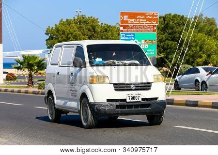 Khor Fakkan, Uae - November 18, 2018: White Cargo Van Suzuki Apv In The City Street.