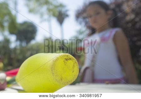Little Girl Close To Lub, Juggling Clubs In The Park. Classic Games For Children Concept
