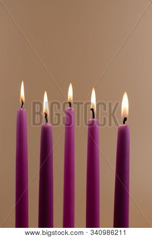 Pink Candles, Burning. Isolated On Faded Orange Background