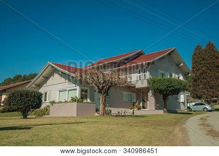 Modern Country House With Pathway And Garden In A Rural Landscape Near Bento Goncalves. A Friendly C