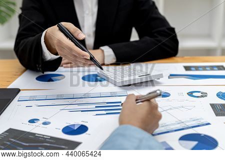 Meeting Room Atmosphere, Business People Meeting Together On Finance Topics, They Are Working Togeth