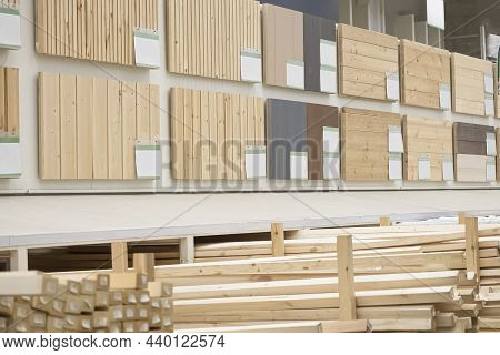 Experience With Woodworking Products In The Warehouse Of A Store With Processed Wooden Bars And Slat