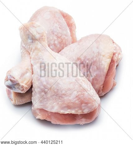 Raw chicken legs isolated on white background.