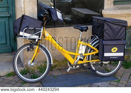 Bordeaux , Aquitaine France - 11 11 2021 : La Poste Postman Bike In French City With Logo Sign And B