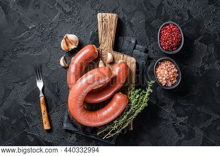 Sucuk Meat Sausage, Sujuk Dry Sausage. Black Background. Top View