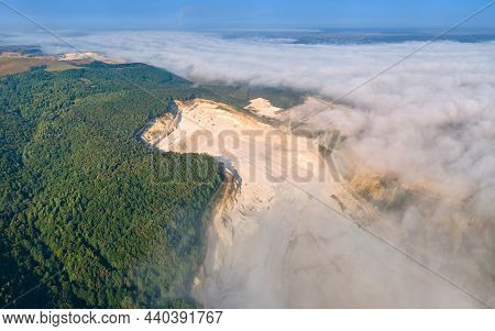Aerial View Of Open Pit Mining Site Of Limestone Materials Extraction For Construction Industry With