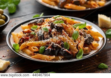 Pasta Alla Norma With Eggplant Or Aubergine, Tomato, Parmesan And Basil. Healthy Food