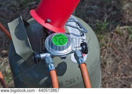 Benodet, France - July 01, 2018: Propane Gas Cylinder With A Regulator From The Company Gok For Camp