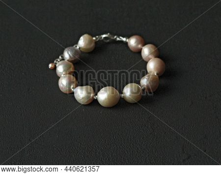 Natural Kasumi Pearls Bracelet. Bracelet Made Of Stones On Hand From Natural Kasumi Pearls. Bracelet