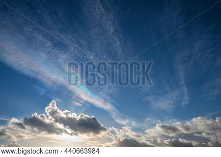 Cirrocumulus Undulatus Clouds With Iridescent Spectral Colors By Reflection Or Refraction, An Optica