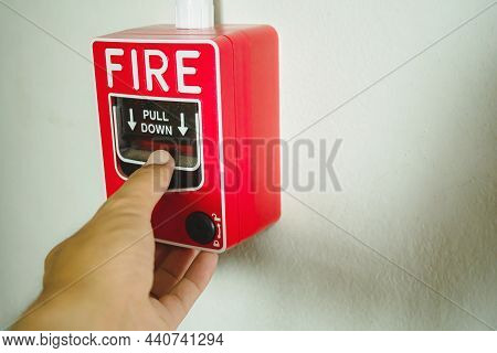Fire Alarm Notifier Or Alert Or Bell Warning Equipment Use When On Fire In The Room. Hand Pushing Do