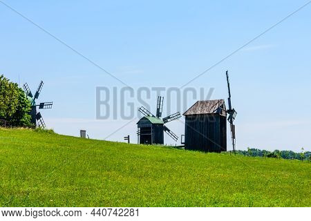 Old Rustic Wooden Wind Mill In Pyrohiv, Ukraine