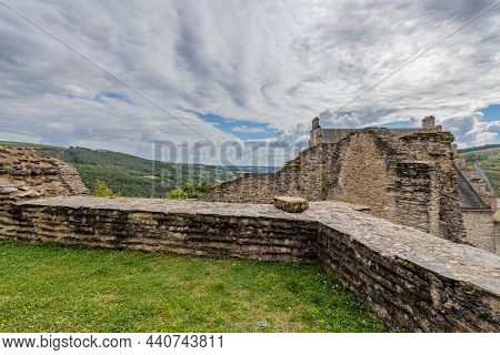 Stone Wall In The Uppermost Courtyard With Dilapidated Walls, Valley With Green Trees,  Blue Sky Wit