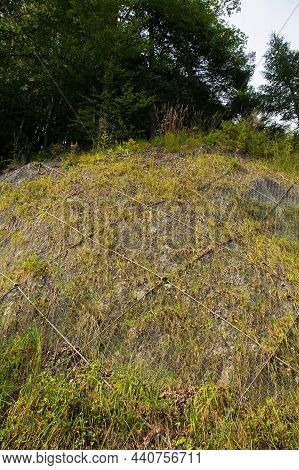 Chain Link Mesh Slope Protection Netting On Monte Ruke Near Sauris Di Sopra, Udine Province, Friuli-