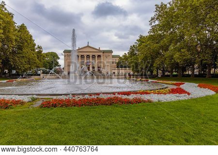 Poznan, Poland - October 2 2020: Square With Fountain In Mickiewicz Park In Front Of The Grand Theat