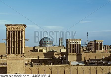 View Of The Rooftops Of The Ancient City Of Yazd With Wind Towers -badgir, With A Painted Round Dome