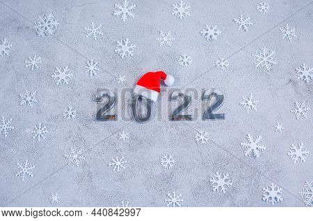 Silver Number 2022 With Hat Of Santa On Fastive Background