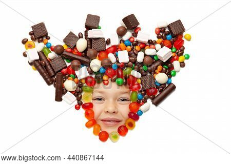 Sweet Little Girl Is A Queen Wearing A Crown Of Candies. Happy Child With Sweets Isolated On White B