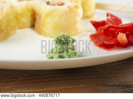 Close-up Of Wasabi On A Plate With Sushi And Ginger. Copy Soace.