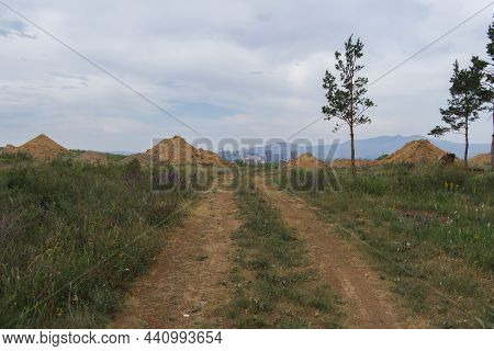 Summer Steppe Landscape. Landscape In Kazakhstan. Kazakh Steppe. Blue Sky. Yellow Grass. Country Roa