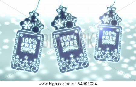 Three Christmas Labels With 100 Percent Freeshipping Sign