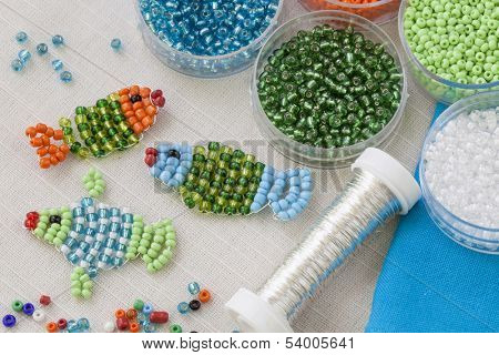 Beaded fishes and colorful beads