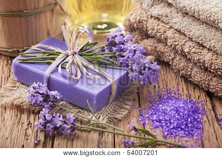 Lavender spa treatment on wooden background