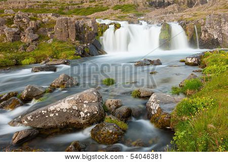 Dynjandi is the most famous waterfall of the West Fjords and one of the most beautiful waterfalls in the whole Iceland. It is actually the cascade of waterfalls  