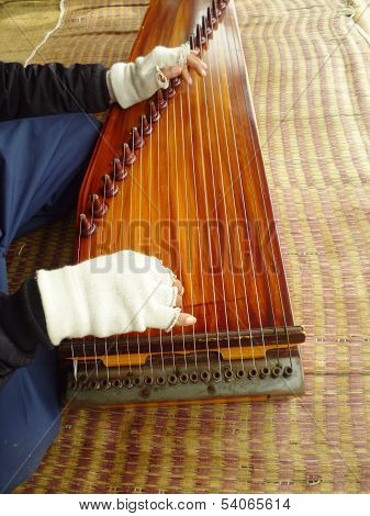 playing a harp