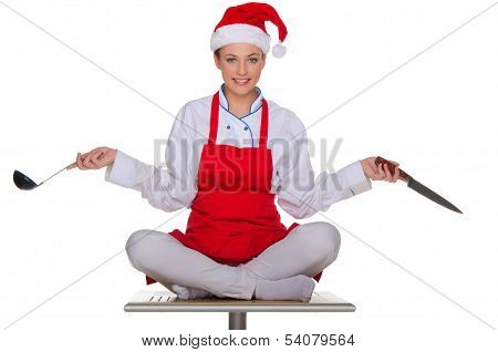 Cook With Dishes In The Cap Of Santa Claus