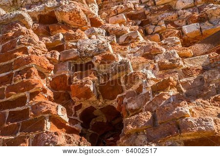Fragment of old brick wall