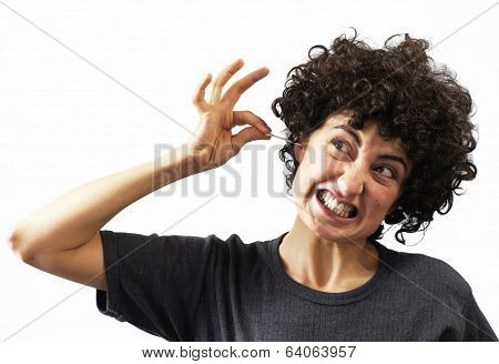 Woman clears her ear