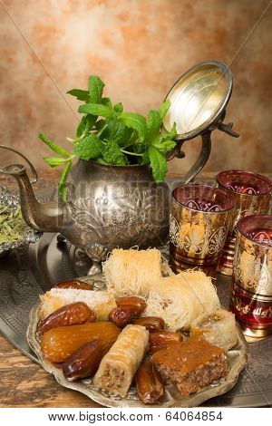 Sweet cookies and dates on a Moroccan tea tray