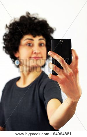 Woman takes a self portrait