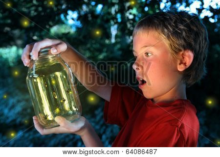 Boy with a jar of fireflies