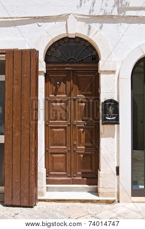 Wooden door. Fasano. Puglia. Italy.