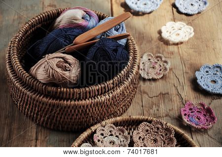Box Of Yarn And Crocheted Flowers