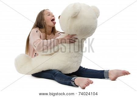 Photo of naughty teenage girl with teddy bear