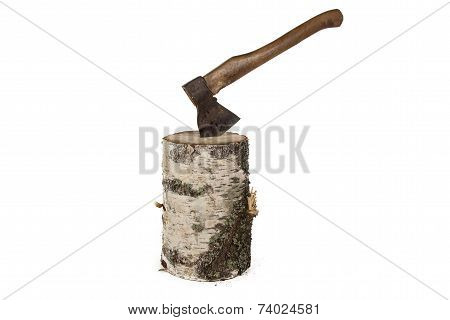 Photo of axe in the birch stump