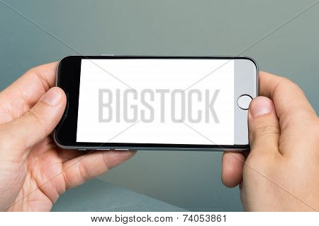 Hand Holding An Apple Iphone 6 With Blank Screen