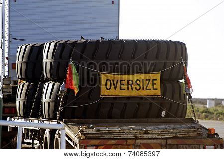 A Large Australian Truck Carries Enormous Mining Equipment