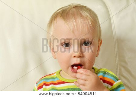 Boy Eating Sweets