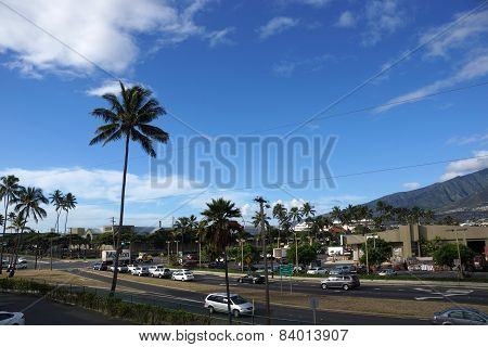 Cars Travel Along Busy Intersect