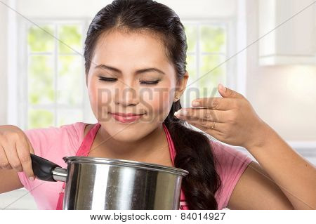 Young Chef Woman Cooking